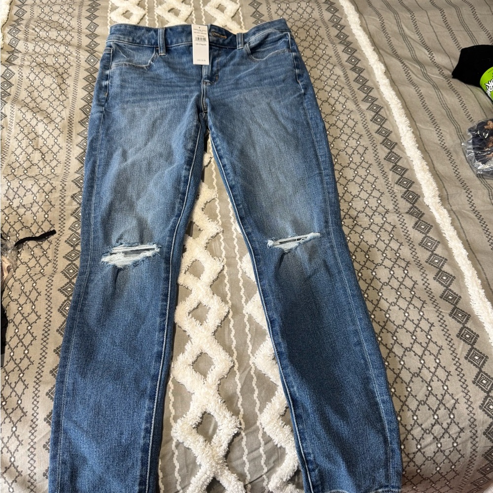 AE Skinny Jeans with Distressed Details